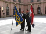 The HGZD flag first use at the 22ICV FlagBerlin 2007. Graham Bartram holds the FIAV flag and Željko Heimer the HGZD flag during the opening ceremony of the Congress.